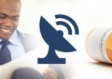 Man Reading Paper and Pill Bottles with Pills Spilling Out